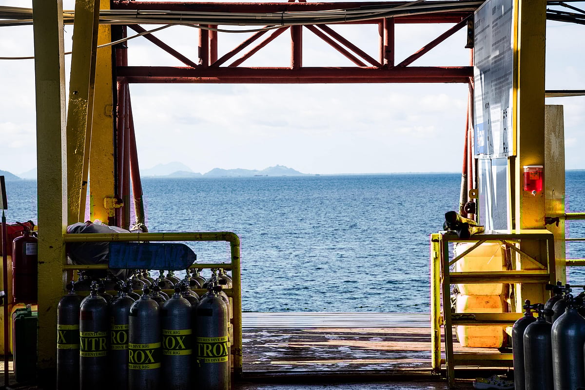 Scuba equipment next to the mechanical lift of the Seaventures Dive Rig