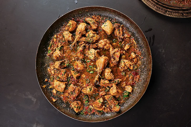 Goalondo Chicken Curry, a dish made with chicken, spices, and mustard oil