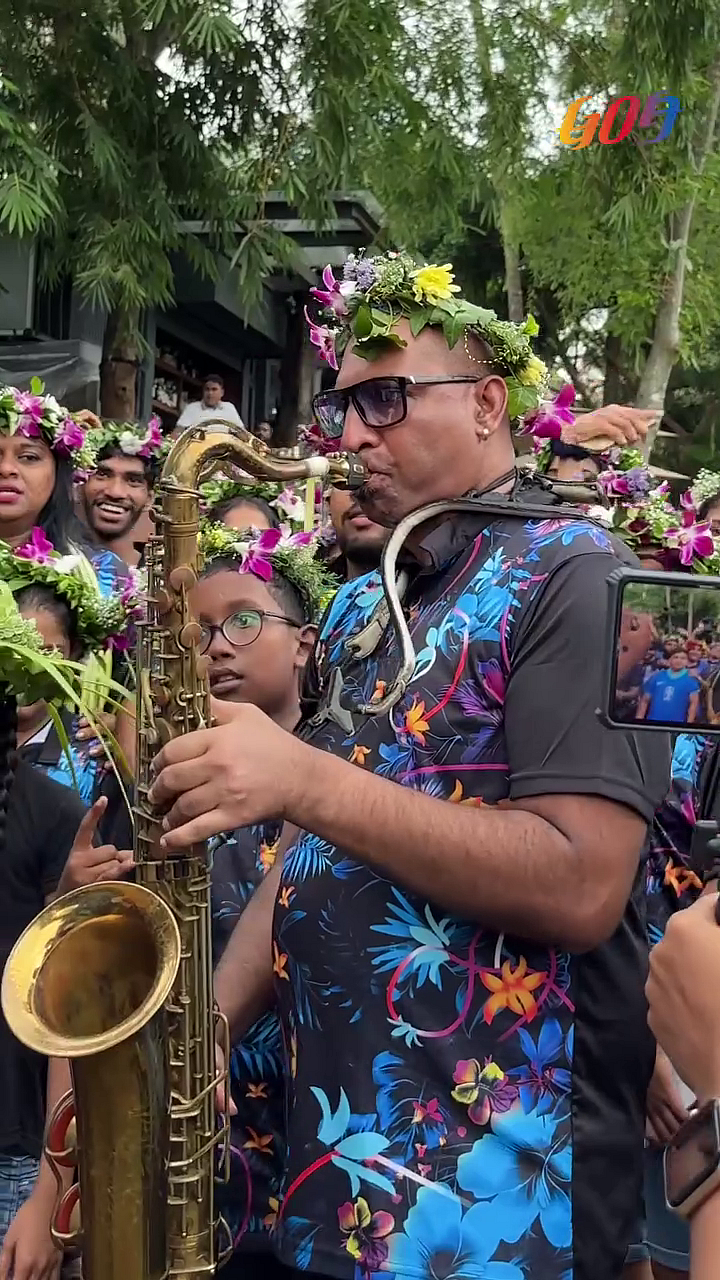 A Goan plays the trumpet at the São João festival