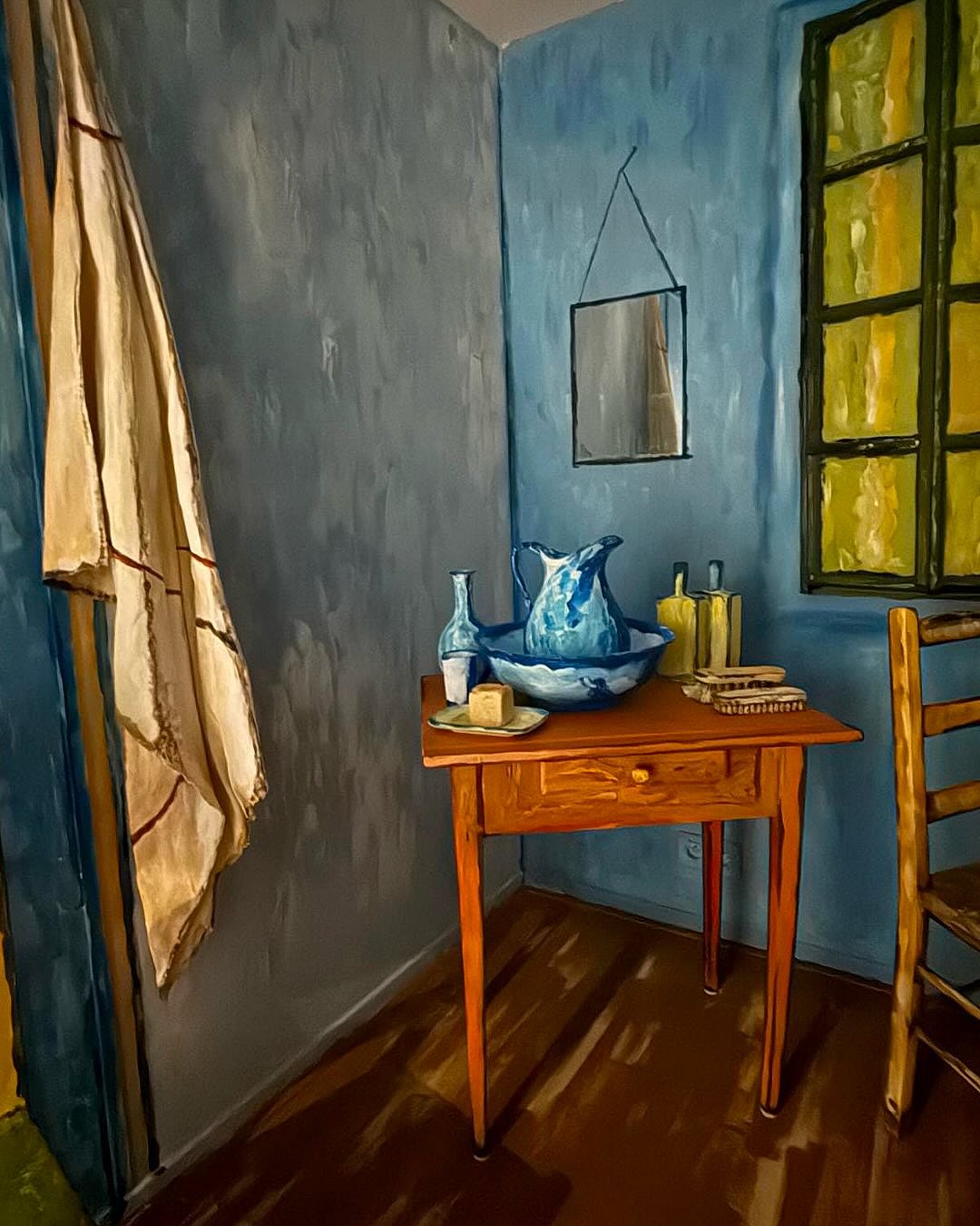 The rooms walls mimic the thick, textured strokes typical of Van Gogh’s style