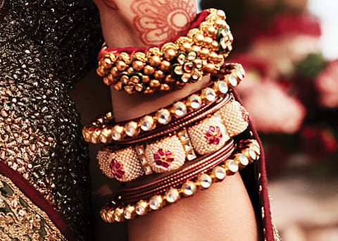 Bangdi, tussi, and hathphool are some pieces that adorn the hands of a Rajasthani bride.