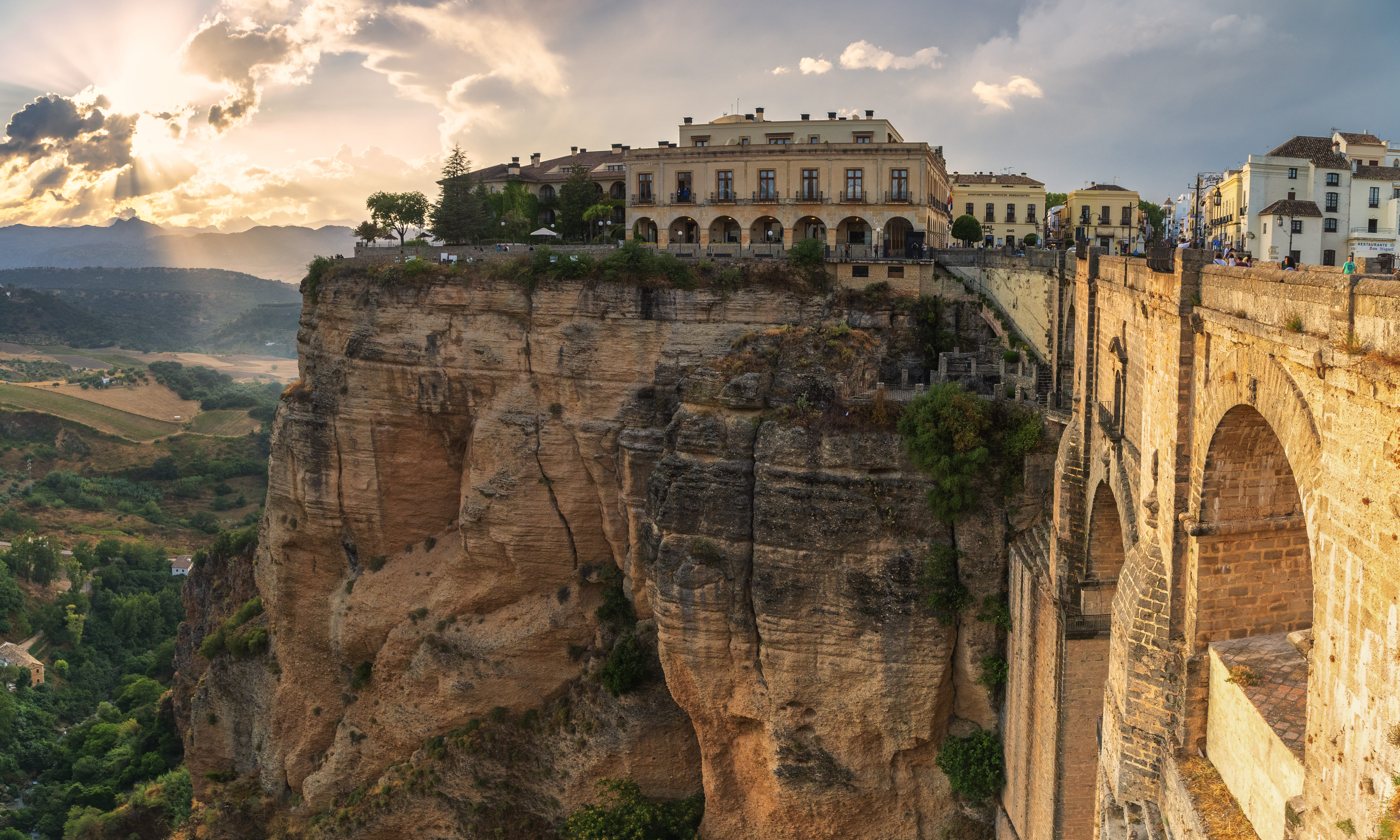The Parador de Ronda perched on the edge of El Tajo Gorge, offering views of the Andalusian landscape
