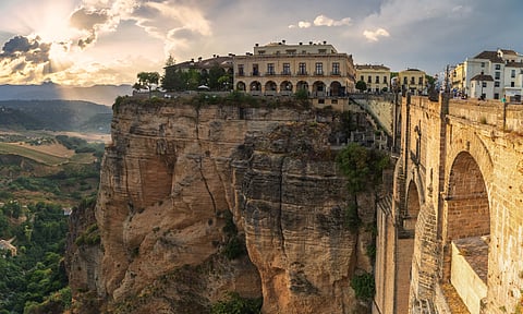 The Parador de Ronda perched on the edge of El Tajo Gorge, offering views of the Andalusian landscape