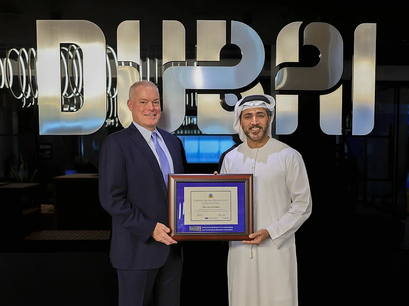 His Excellency Issam Kazim (right), the CEO of Dubai Corporation for Tourism and Commerce Marketing, and Myron Pincomb (left), the IBCCES Board Chairman and CEO, at the announcement of Dubai as a “Certified Autism Destination”