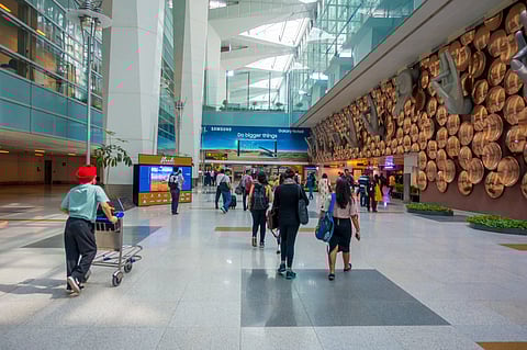 Passengers inside Delhi International Airport