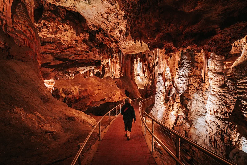 Discover eastern Americas largest and most popular caverns with cathedral-sized rooms filled with towering stone columns and crystal-clear pool