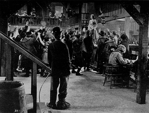 Charlie Chaplin watches Georgia Hale in 'The Gold Rush'