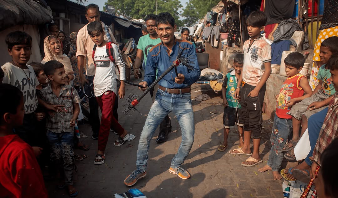 A performance goes on at Kathputli Colony