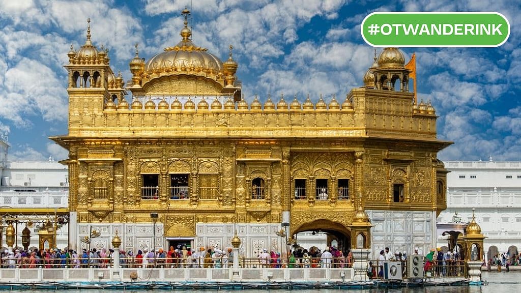 OlegD/Shutterstock : The Golden Temple in Amritsar serves langar to thousands of devotees every day