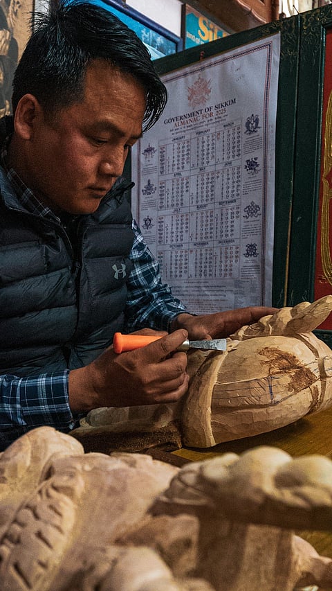 A mask maker in Gangtok, Sikkim at work