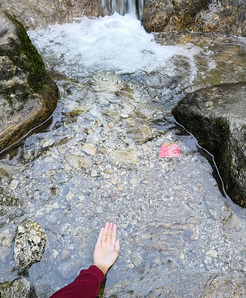 The crystal-clear waters of the Bakthang Waterfall