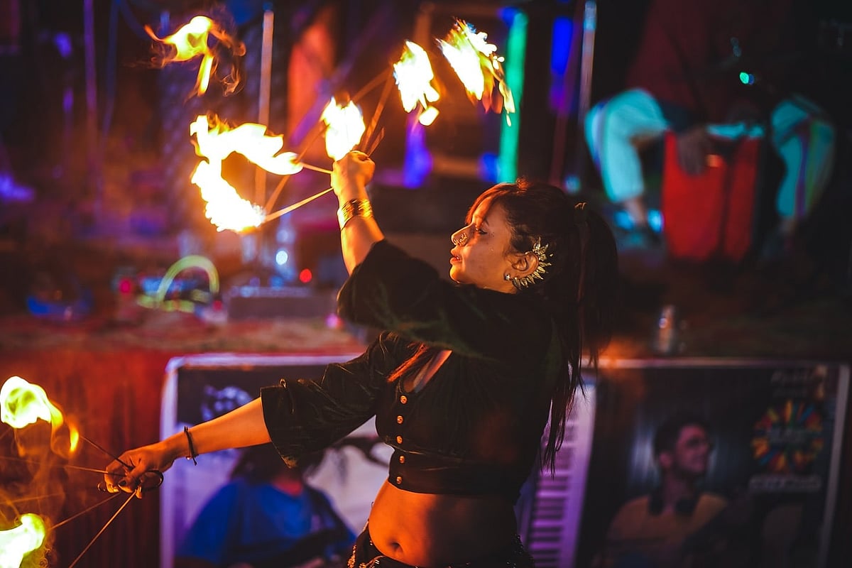 A fire performer at the Bir Music Festival