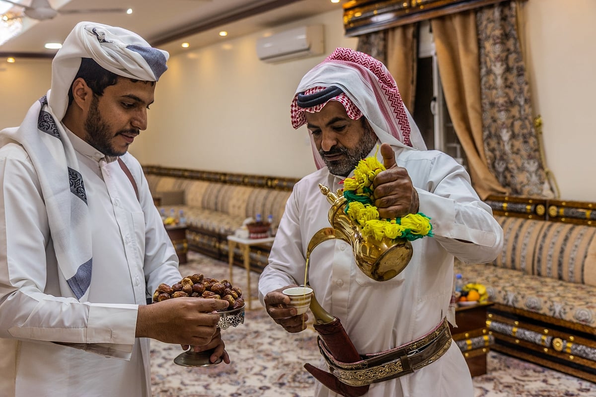 Members of a Saudi tribe drink traditional coffee in the Najran region of Saudi Arabia