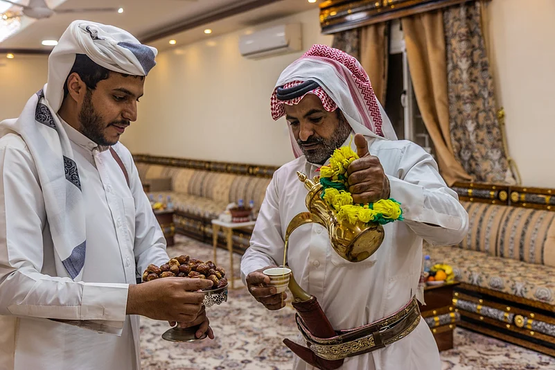 Members of a Saudi tribe drink traditional coffee in the Najran region of Saudi Arabia