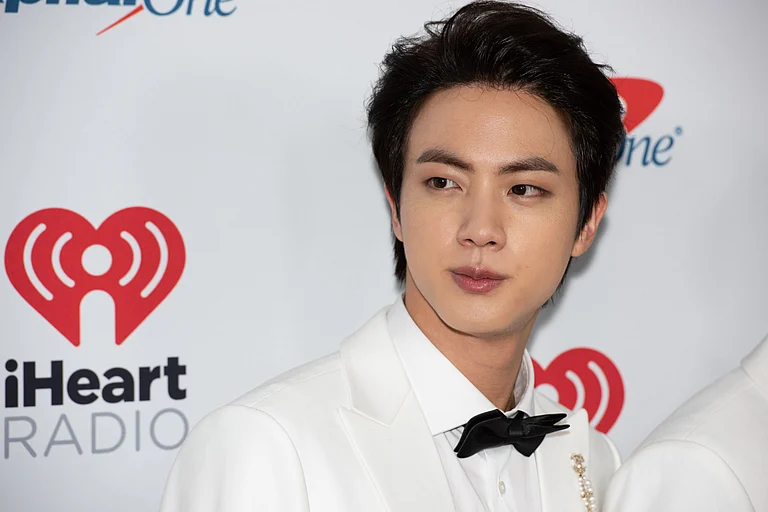 Jin from the South Korean boy band BTS collaborated with the Singapore Tourism Board for his new single “Don’t Say You Love Me” - Silvia Elizabeth Pangaro/Shutterstock