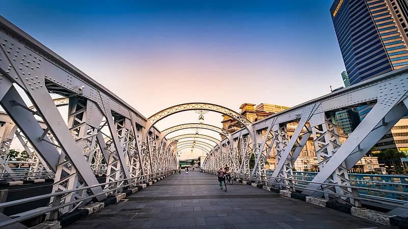 Built in 1910, the Anderson Bridge connects Merlion Park and Esplanade Park near the mouth of the Singapore River