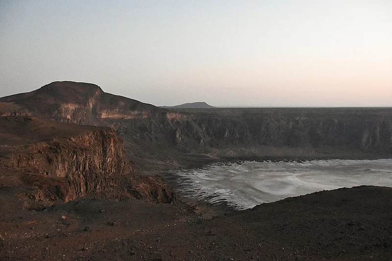 The Al Wahbah Crater is a volcanic site with a lake