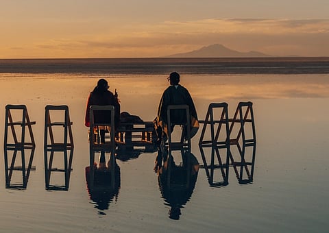 Mirror effect on salt flats at the Palacio de Sal in Bolivia