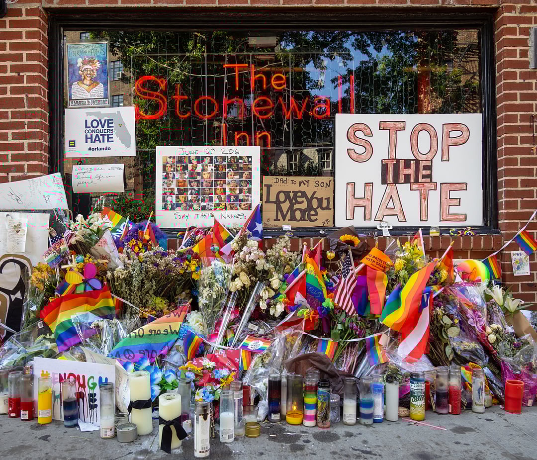 Stonewall Inn with Orlando nightclub shooting memorial during Pride 2016