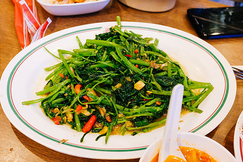 Stir-fried morning glory is one of Thailand's most popular dishes. It is made with water spinach, chillies, garlic and fermented soybeans