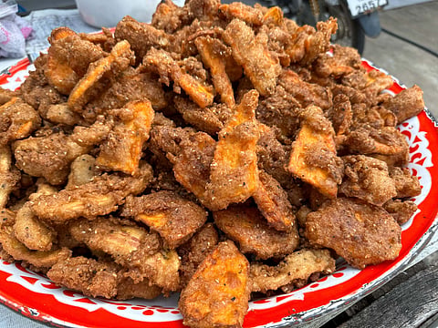 Kluay kaek is a popular street food snack made of deep-fried sliced bananas