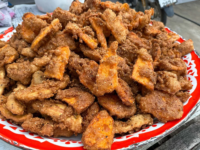 Kluay kaek is a popular street food snack made of deep-fried sliced bananas