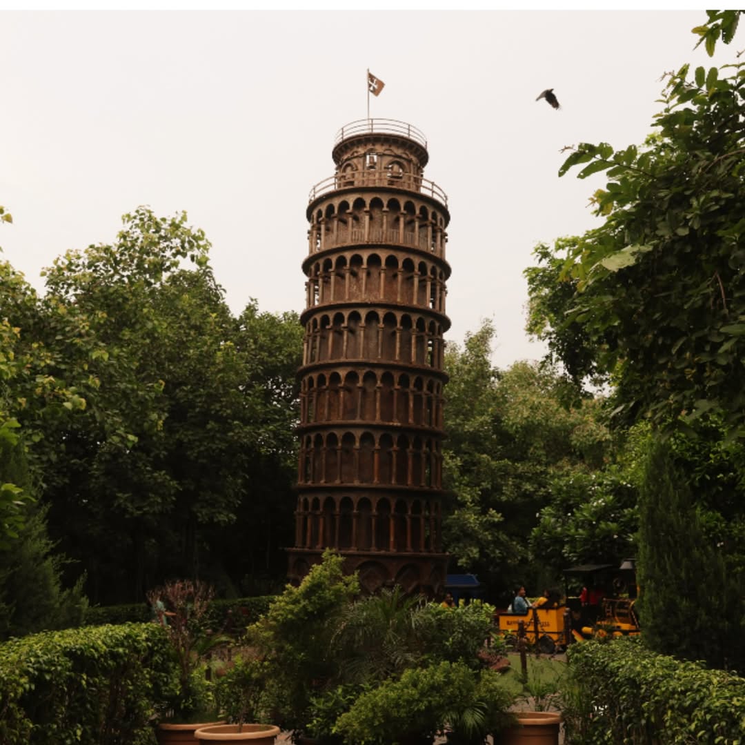 A replica of the Leaning Tower of Pisa at the Waste to Wonder Park in Delhi