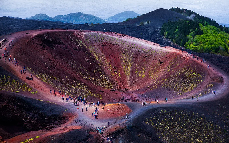 Tourists visit volcanic craters in Etna National Park
