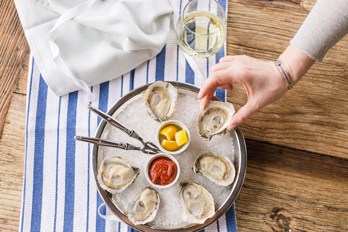 Image Courtesy: Virginia Tourism Corporation : Indulge yourself at the annual spring wine and oyster festival hosted by mountain vineyards