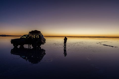 Embark on a 4WD tour to experience the expansive salt flats