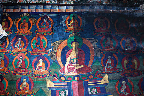 A painting in the process of being restored, half cleaned and half uncleaned