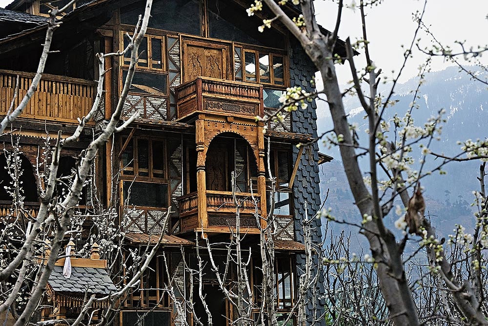 A three-storey structure adapted from the Dhajji model using Himalayan timber