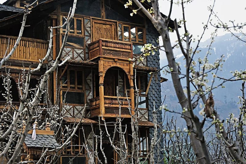 A three-storey structure adapted from the Dhajji model using Himalayan timber