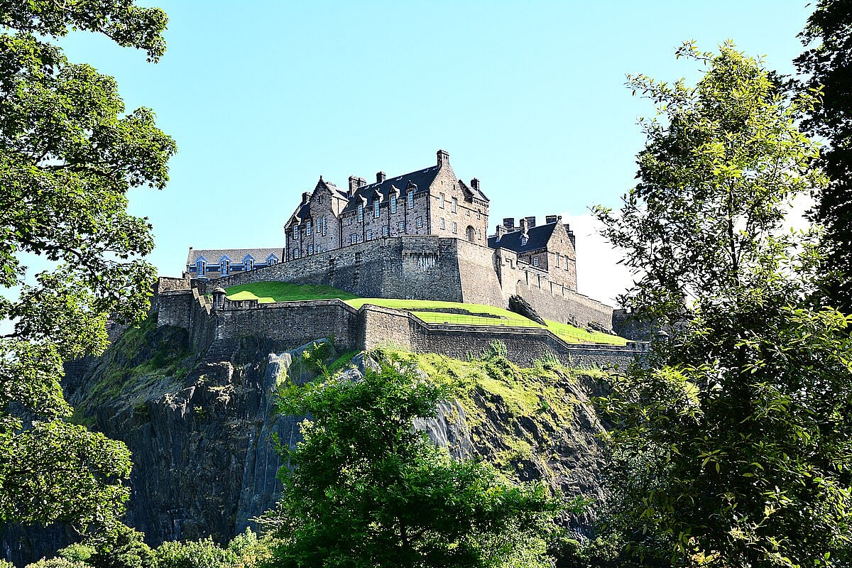 The castle sits on top of an old volcano, in the centre of the city of Edinburgh, Scotland