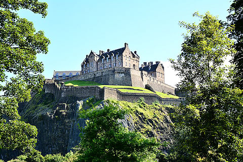The castle sits on top of an old volcano, in the centre of the city of Edinburgh, Scotland