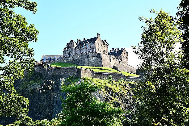 The castle sits on top of an old volcano, in the centre of the city of Edinburgh, Scotland