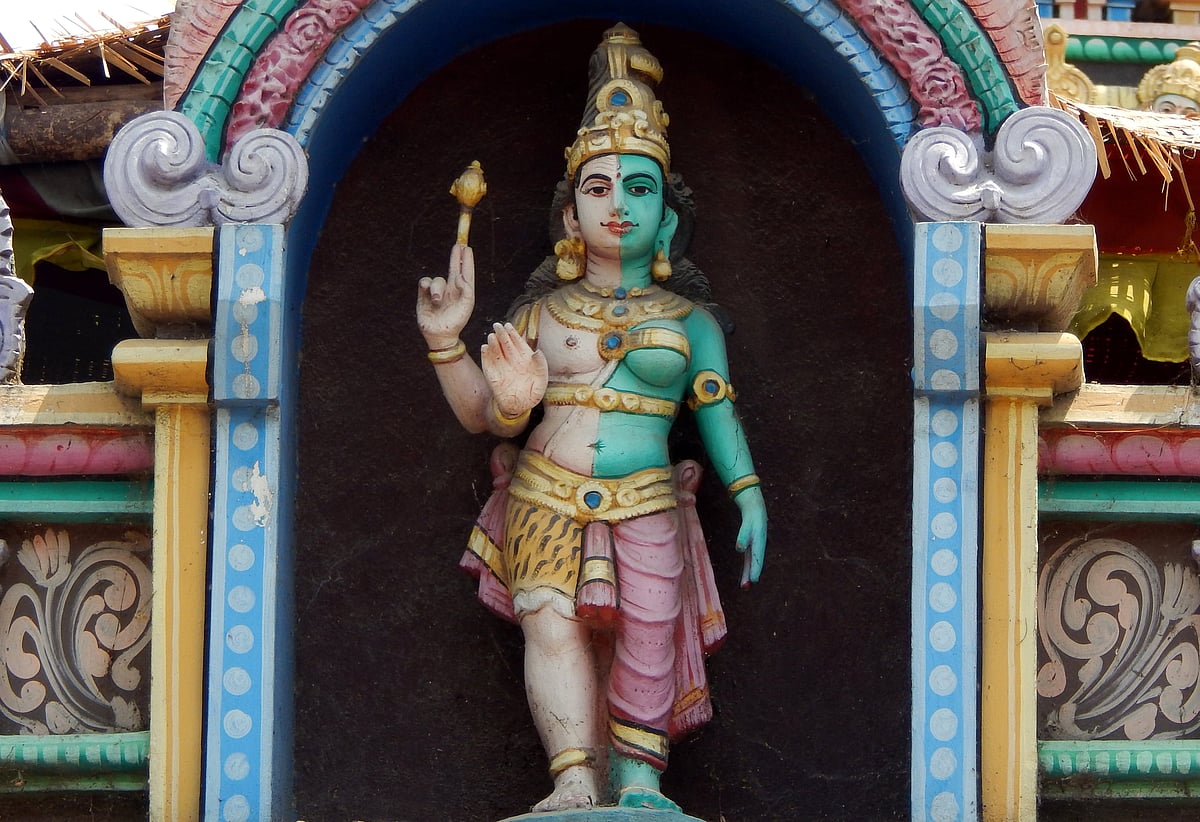 An Ardhanarishvara statue at a temple. This is the combined form of the Hindu deities Parvati and Shiva