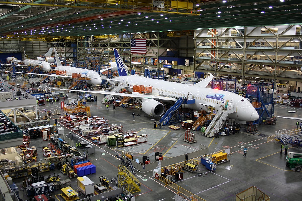 Boeing employees work on a 787 jet at the Everett factory in Washington state