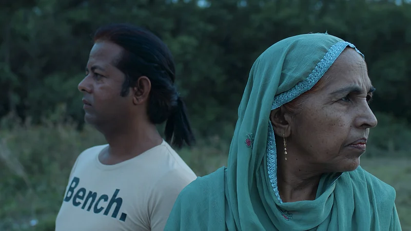 Babban (left) with their mother, who struggles to accept their trans identity