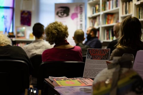 At a photography exhibition Through A Lavender Lens, which highlighted the legacy of Lavender Menace and celebrated the people behind it