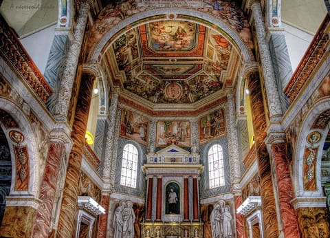 The interior of the chapel is adorned with stunning frescoes