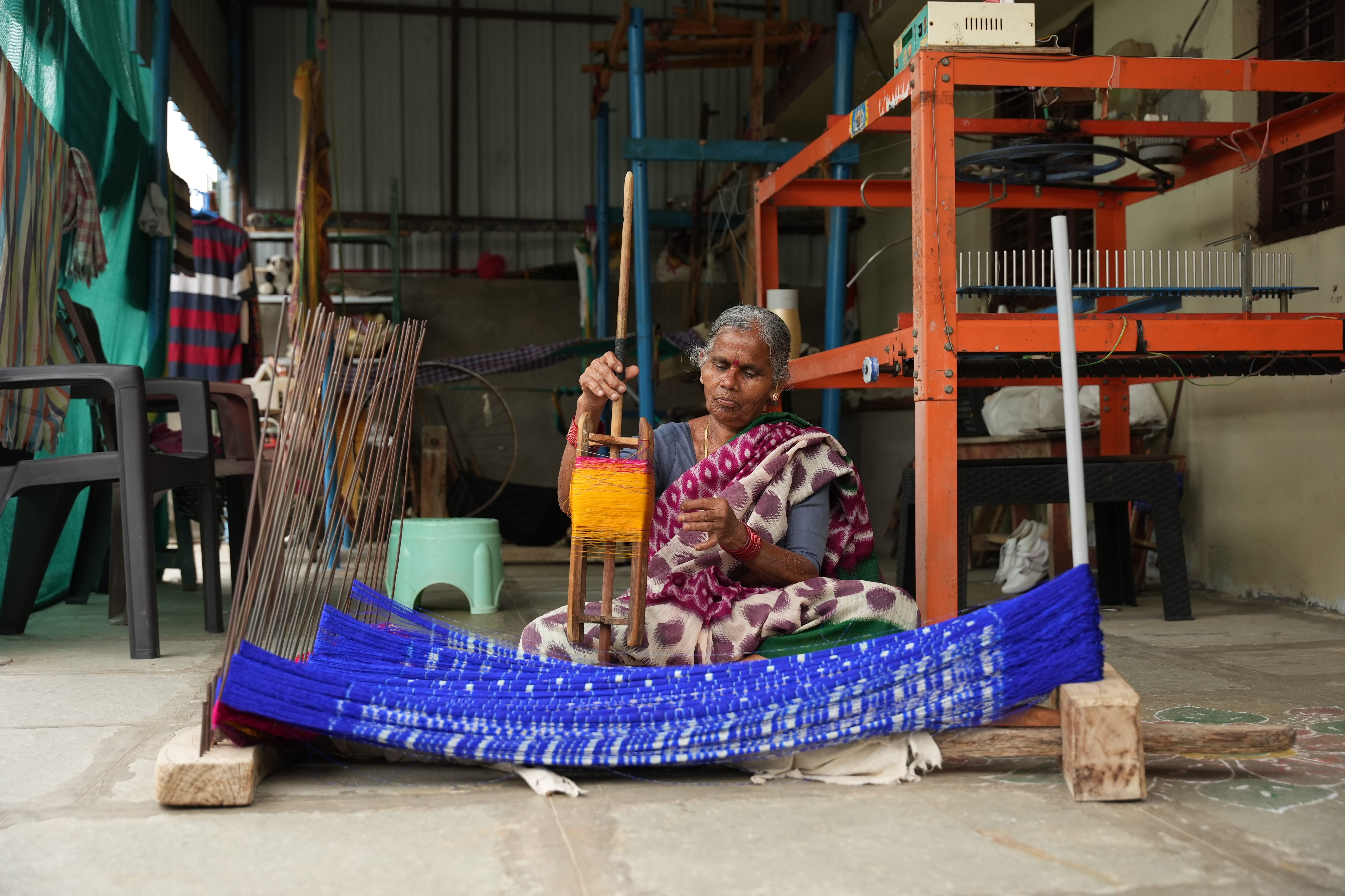 An artisan making Pochampally Ikat