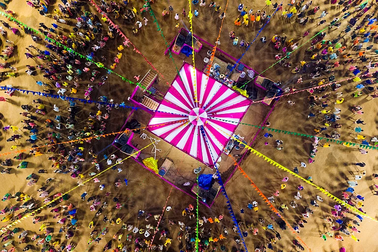 People dancing with joy during the Navratri festival. - Shutterstock