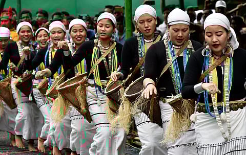 Assamese women perform a traditional dance in the Baksa district