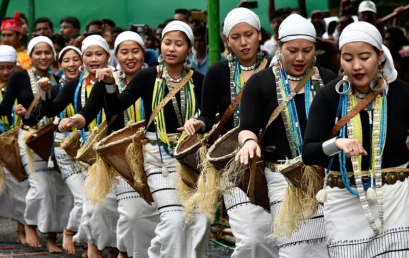 Assamese women perform a traditional dance in the Baksa district