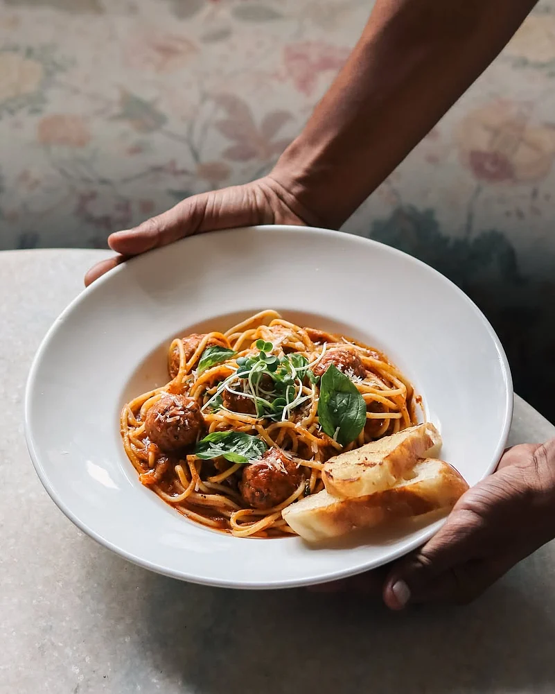 Harrisa spaghetti with chicken meatballs by the Coromandel Cafe