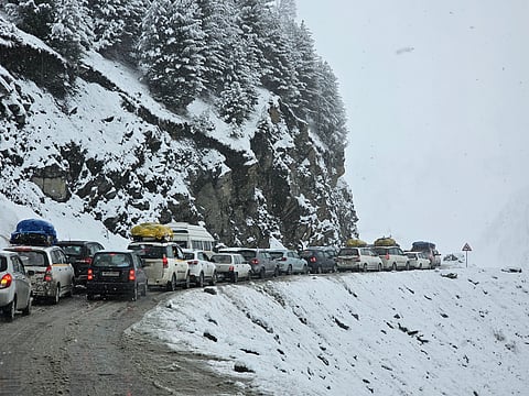 Vehicles stuck at National Highway 1 that runs between Jammu and Kashmir and Ladakh due to heavy snowfall 