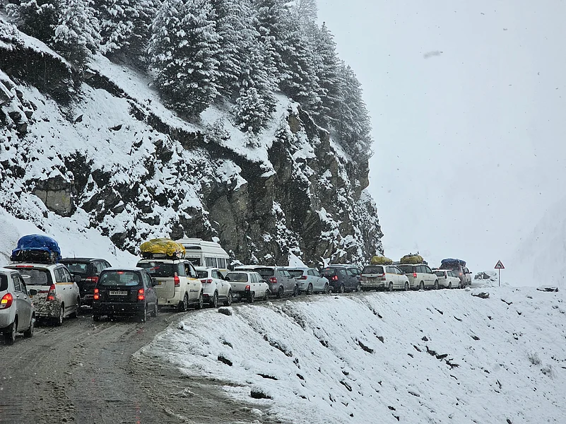 Vehicles stuck at National Highway 1 that runs between Jammu and Kashmir and Ladakh due to heavy snowfall
