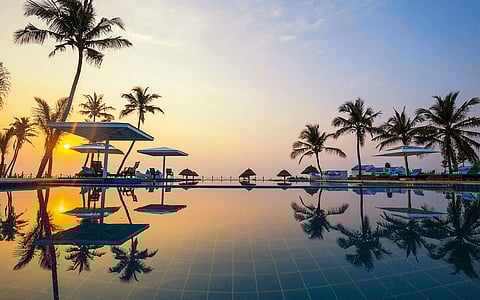 Poolside at the Welcomhotel by ITC Hotels, Kences Palm Beach