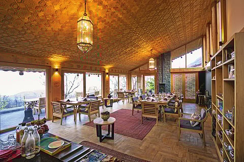 Set on a ridge high above the calm waters of Dal Lake with a backdrop of the Zabarwan Hills, Qayaam Gah is a place to slow down